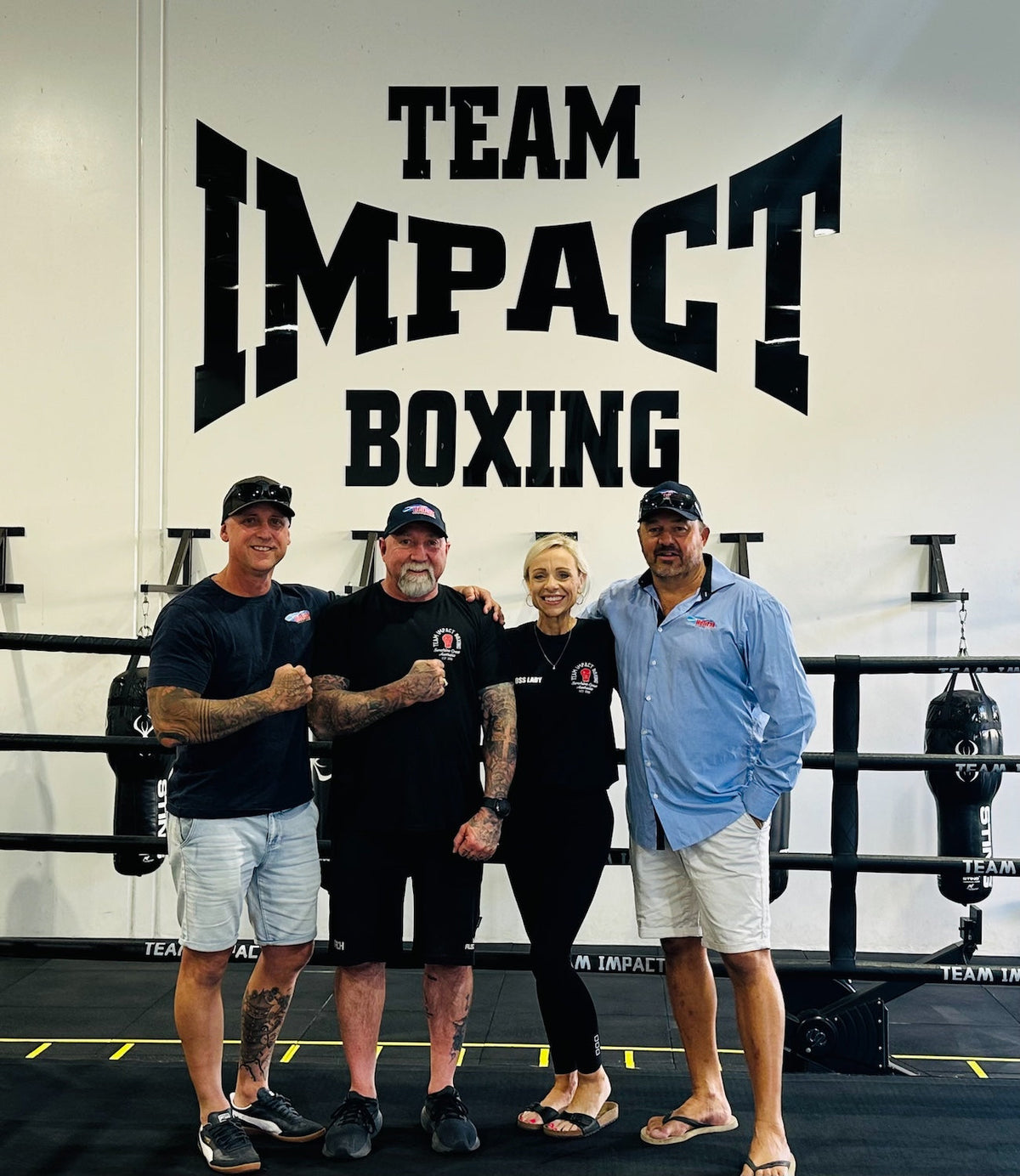 Mark and Kylie from Impact Boxing and Fitness with the Helitak team in the boxing ring
